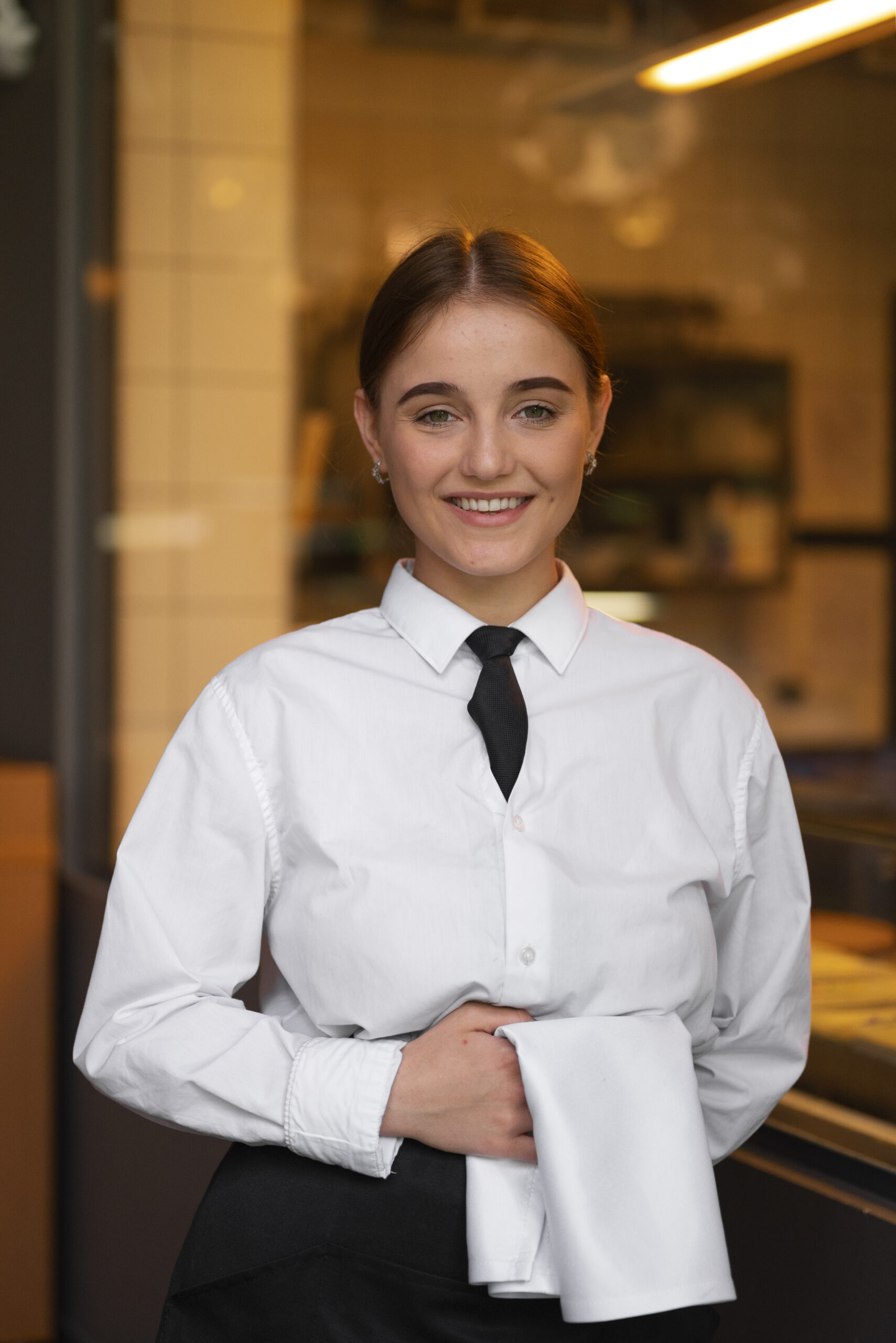 medium-shot-woman-working-luxury-restaurant-scaled.jpg
