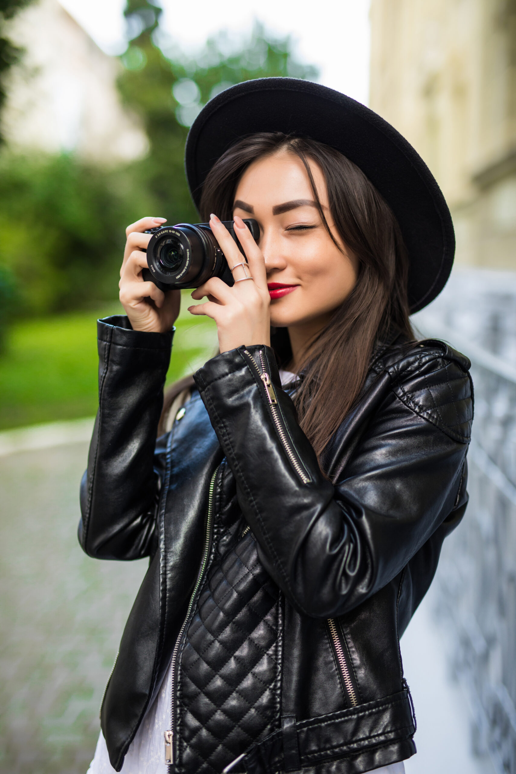 young-beautiful-asian-traveler-woman-using-digital-compact-camera-smile-looking-copy-space-journey-trip-lifestyle-world-travel-explorer-asia-summer-tourism-concept-scaled.jpg